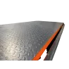 Zoom sur le plancher anti-dérapant.
